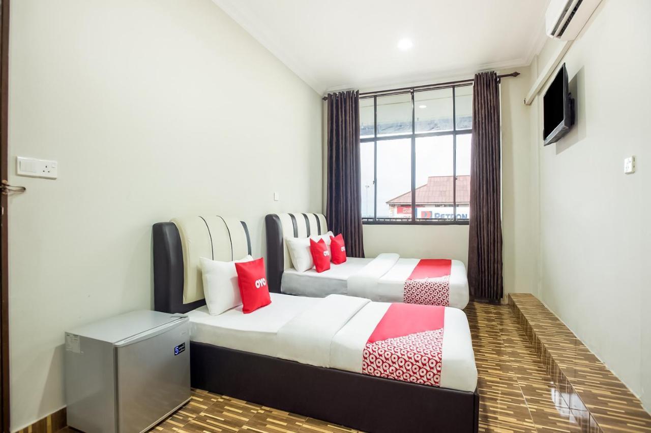 Oyo 89712 Grand Inn Семпорна Стая снимка
